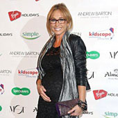 Jenny Frost wearing the Amelia Dress (Black) by Tiffany Rose at the Specsavers Awards 2012